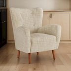 Fauteuil d'appoint dossier haut beige | Tissu performance résistant aux UV | Accoudoirs incurvés | Pieds coniques en bois